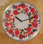 Show more information about Clock for wall red dots deco
clock with coloured dots decoration